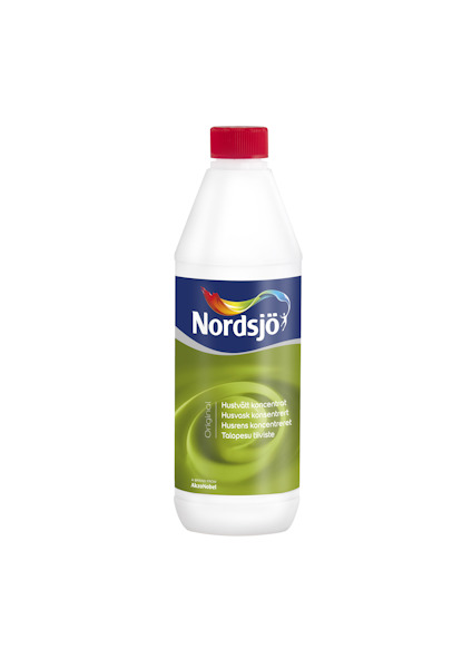 Flaska med rött lock och etikett med texten "Nordsjö" och "Hustvätt koncentrat".