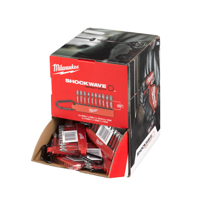 Röd och svart kartong med logotypen "Milwaukee" och texten "Shockwave". Paket med bits synliga i öppning.