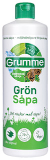 Grön flaska Grumme Grön Såpa med grön kork, etikett med text och miljövänliga symboler.