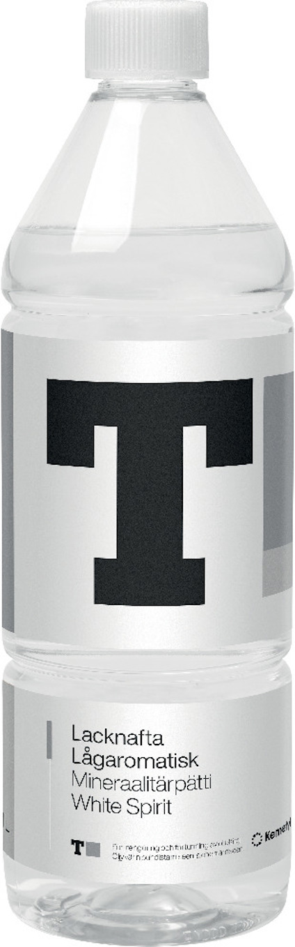 Transparent flaska med etikett som visar stor bokstav "T" och texten "Lacknafta Lågaromatisk Mineralterpentin White Spirit".