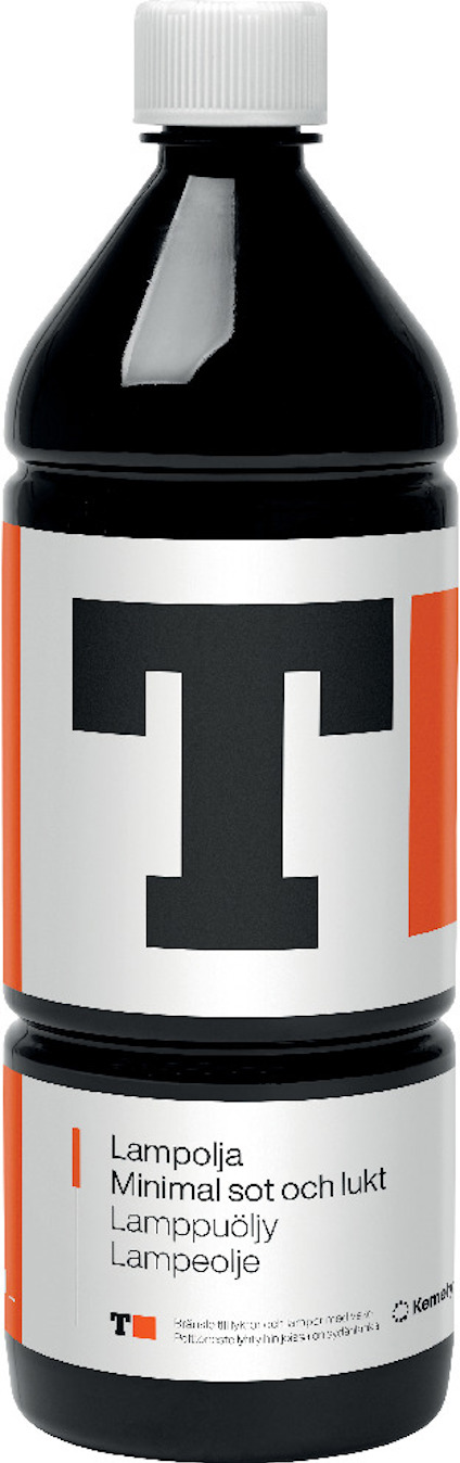 Flaska med lampolja, etikett med stor bokstav "T", text på svenska om minimal sot och lukt.